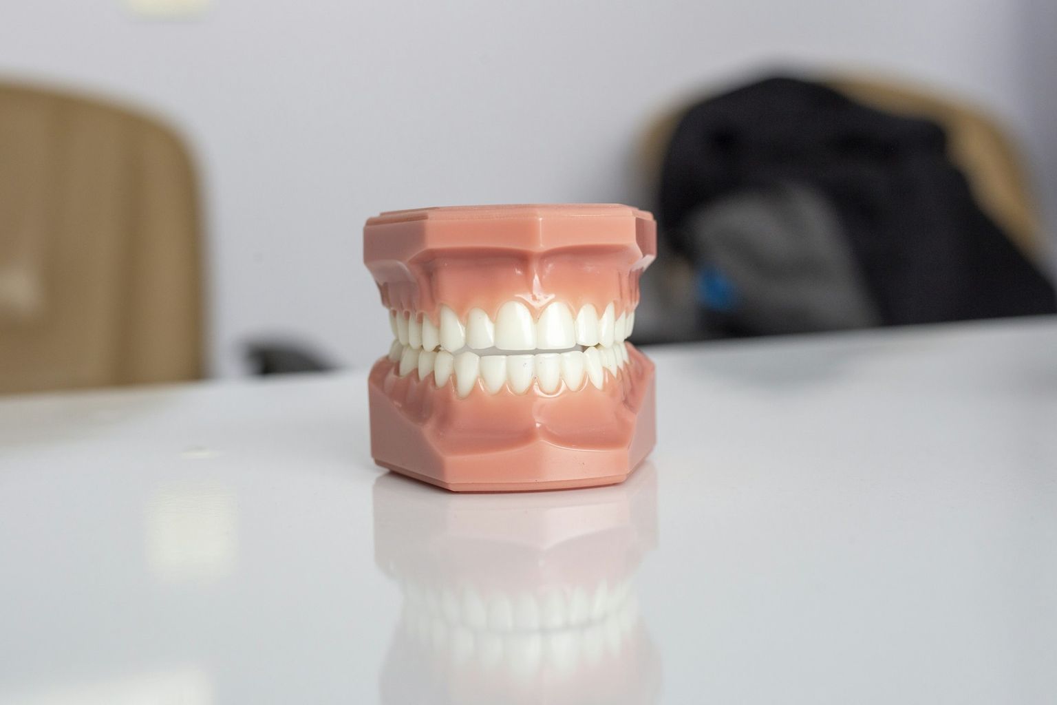 A full denture on a white table
