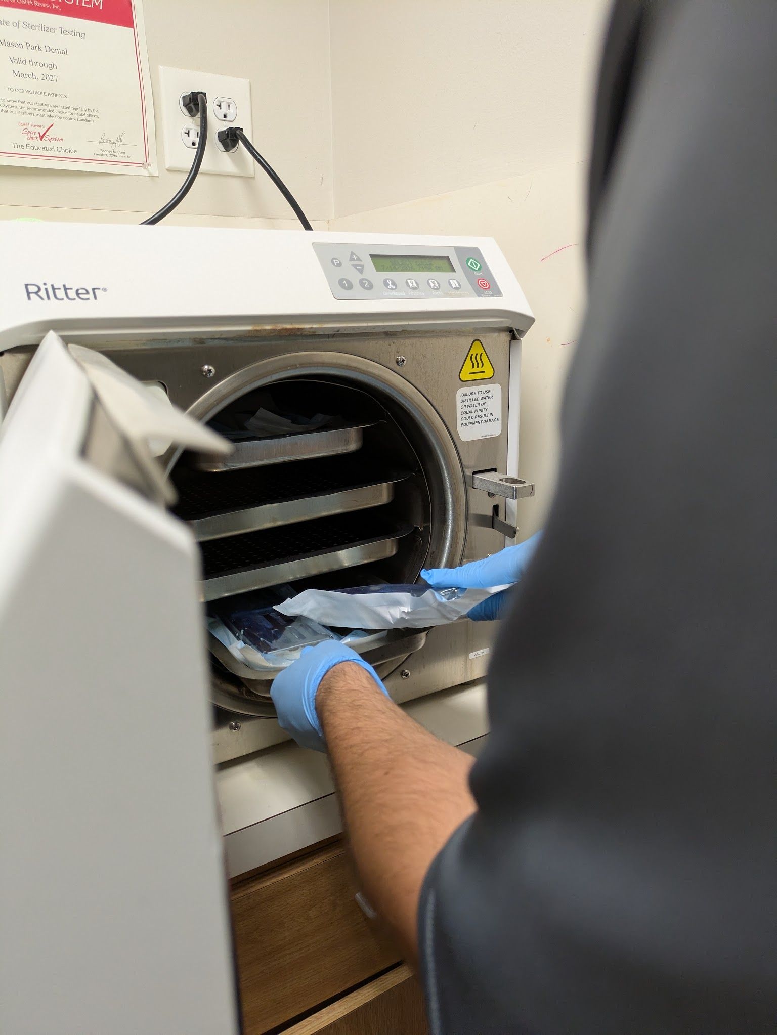 A sealed instrument pouch going into the sterilizer